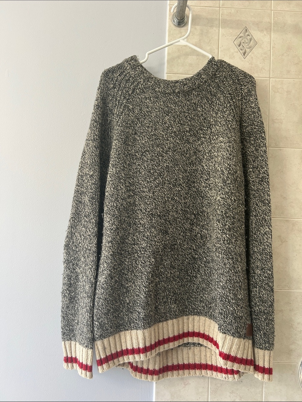 Roots Marled Black & Cream Crewneck Sweater with Red Stripe